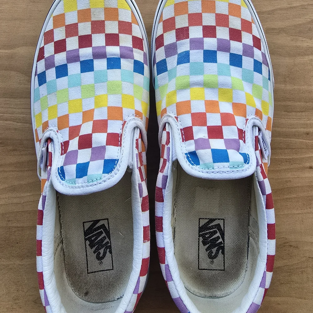 Vibrant Kid’s Vans Rainbow Checkerboard Slip-Ons – Playful + Iconic